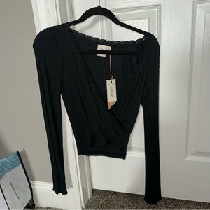 NWT wrap front long sleeve black top